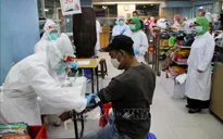 Số ca nhiễm mới COVID-19 trong ngày cao kỷ lục tại Indonesia
