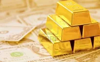 Vàng bị bán tháo sau tuyên bố của FED