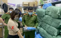 Truy tố 4 bị can trong đường dây làm giả hơn 14.500 bộ đồ phòng dịch COVID-19