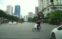 Phóng nhanh vượt đèn đỏ, nam thanh niên gây họa cho người đi xe máy