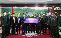 Bộ Quốc phòng Lào ủng hộ Quỹ phòng chống COVID-19 của Việt Nam 200.000 USD