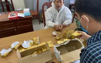 Hai ô tô chở 56 kg vàng lậu