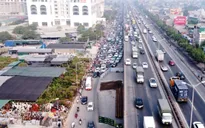Xén dải phân cách để giảm ùn tắc đường Nguyễn Xiển