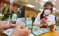 Lãi suất ngân hàng “hạ nhiệt”, giảm khoảng 1%/năm