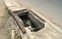 Nắp cống hư hỏng "bẫy" người đi đường