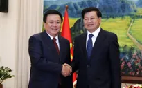 Tăng cường trao đổi thông tin, nghiên cứu về lý luận và thực tiễn giữa Việt Nam và Lào