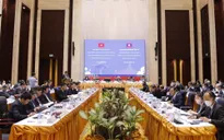 Trao đổi lý luận và thực tiễn phát triển Việt Nam - Lào