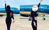 Cấm bay nữ hành khách tạo dáng sát máy bay đang di chuyển để quay video