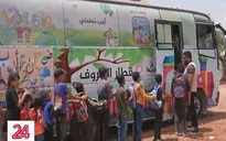 Lớp học trên xe bus dành cho trẻ em vùng động đất Syria