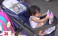 Người di cư chờ vào Mỹ trong nắng nóng thiêu đốt