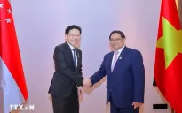 Thủ tướng Phạm Minh Chính gặp Thủ tướng Singapore Lawrence Wong