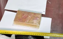 Bắt quả tang 3 đối tượng mua bán trái phép 1 bánh heroin