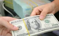 Tỷ giá dịu lại sau khi Fed hạ thêm lãi suất