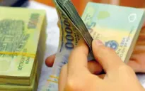 Người nợ thuế bị khấu trừ tiền lương như thế nào?