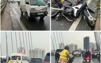 Xe máy chở hoa va chạm với ô tô trên cầu Nhật Tân, một người tử vong