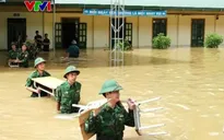 Nhiều điểm trường, trạm y tế bị chia cắt do lũ
