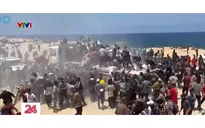 Đám đông giành giật viện trợ ở Dải Gaza