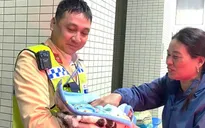 Cảnh sát giao thông hỗ trợ sản phụ sinh con trên đường đến bệnh viện