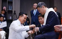 Thủ tướng Lê Minh Hưng dự lễ buộc chỉ cổ tay truyền thống của Lào