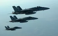 Mỹ không kích 12 mục tiêu của IS ở Syria