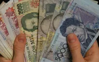 Đồng bolivar mất giá, kinh tế Venezuela cận kề siêu lạm phát