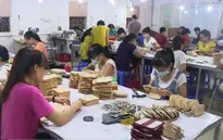Trung Quốc phá giá đồng Nhân dân tệ: DN da giày, dệt may Việt Nam bình thản
