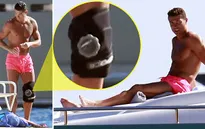 Ronaldo vừa nghỉ mát vừa đeo bảo vệ đầu gối to sụ