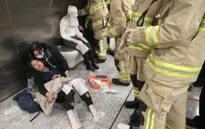 Cháy trên tàu điện ngầm ở Hong Kong (Trung Quốc), 17 người bị thương