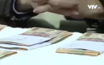 Thủ đoạn tiêu thụ tiền giả tại Việt Nam