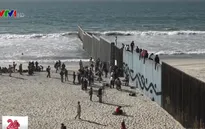 Binh sĩ Mỹ dựng hàng rào thép gai ngăn đoàn người di cư từ Mexico