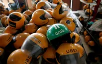 Nhân viên Grab làm việc ngày đêm để tiếp quản Uber
