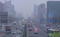 Nhiều thành phố Trung Quốc chìm trong sương mù và khói bụi