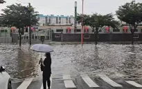 Mưa lớn gây ngập lụt diện rộng tại Hàn Quốc
