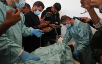 Israel trao trả 15 thi thể người Palestine về Gaza 