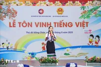 Vietnamese community in Laos honour mother tougue