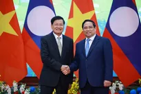Prime Minister welcomes Lao Party General Secretary and President in Hanoi