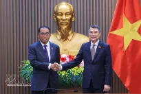 PM Le Minh Hung receives Malaysian Minister of Defence Mohamed Khaled bin Nordin