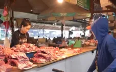 Người dân thận trọng nhưng không quay lưng với thịt lợn