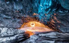 Đẹp kỳ ảo băng lửa ở hang băng lớn nhất châu Âu