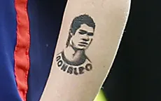 Con trai Rooney "xăm hình" Ronaldo trên cánh tay