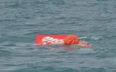 AFP: Đuôi chiếc máy bay AirAsia đã được nâng khỏi mặt nước