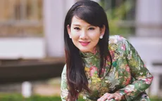 Mỹ Uyên thướt tha áo dài đón Tết