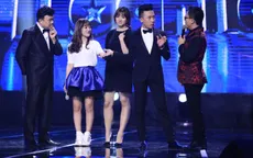 Hari Won miễn cưỡng nhìn tình địch nắm tay Trấn Thành