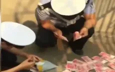 “Cơn mưa tiền” bất ngờ xuất hiện trên bầu trời Trung Quốc