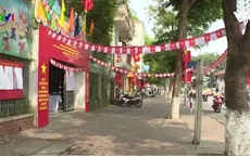 Đường phố Hà Nội rực rỡ cờ hoa trước ngày bầu cử