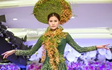 Quán quân Vietnam's Next Top Model 2015 duyên dáng với áo dài kết hoa