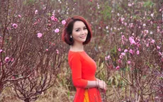 Mai Thu Huyền đẹp rạng ngời giữa vườn đào Hà Nội