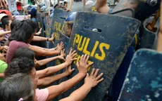 Philippines: Xe cảnh sát cán người biểu tình