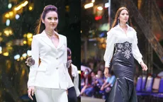 Jolie Phương Trinh  cùng Nguyễn Thị Loan đội mưa trình diễn catwalk