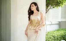 Á hậu Tú Anh khoe thân hình đồng hồ cát với váy ôm bó sát